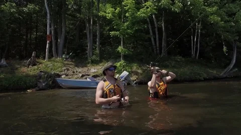 Aerial Fishermen Casting Standing In Lak 