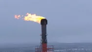 Aerial. A Flame From A Chimney Of The Plant Stock Footage