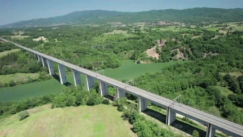 Aerial flight 4K view orbit rail bridge for HIGH Speed Italian-europeans trains 스톡 동영상 196233990