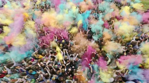 Aerial flight above dancing crowd on Holi Festival Of Colors Stock Footage 51448218