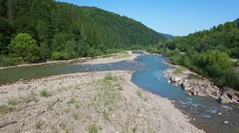 Aerial: flight above mountain river Stock Footage 55546249
