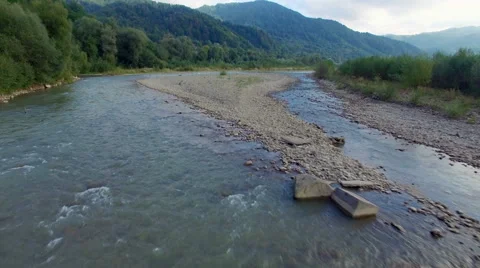 Aerial: flight above mountain river Stock Footage 55546338