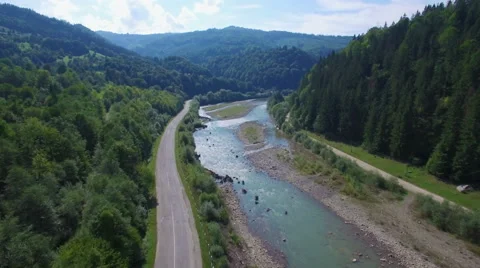 Aerial: flight above mountain river Stock Footage 55548846