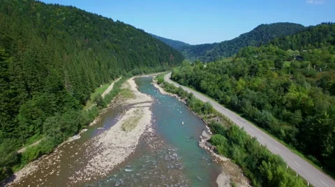 Aerial: flight above mountain river Stock Footage 55550383