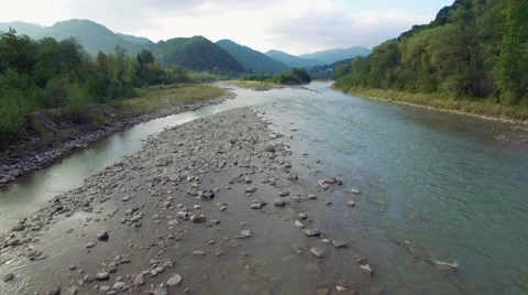 Aerial: flight above mountain river Stock Footage 55668628