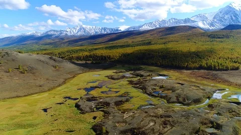 Aerial flight above mountain river meanders in autumn Stock Footage 80383493