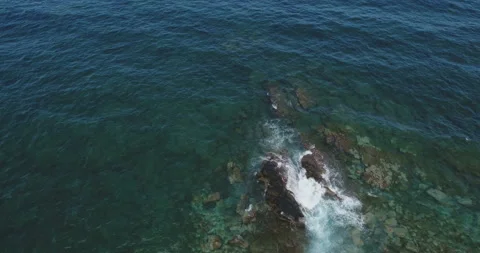 Aerial flight above seashore reverse montage Stock Footage 100141398