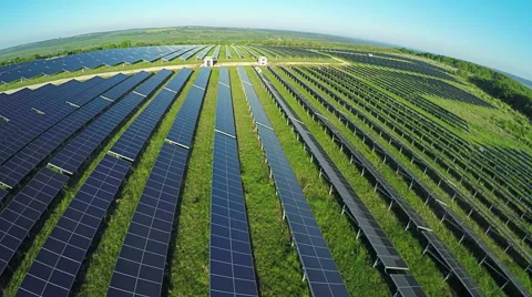 AERIAL, flight above solar panel electricity station Video stock 63273738