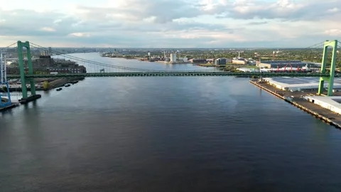 Aerial Flight along Delaware River and Walt Whitman Bridge Philadelphia Stock Footage 240694875