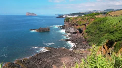 Aerial Flight Along Dramatic Volcanic Coastline of Terceira Island, Azores in 4K Stock Footage 335991547