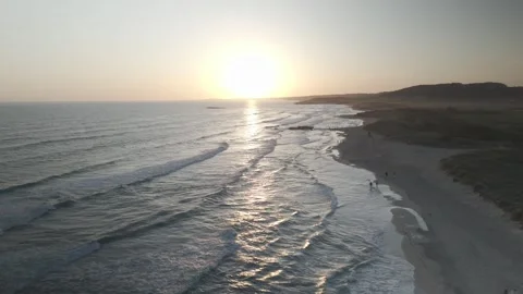 Aerial Flight Along Son Bou Beach with Sunset and Coastal Resort View Stock Footage 344438286