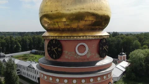 Aerial flight alongside clock tower of Voznesenskaya Davidova Pustyn Stock Footage 326168238