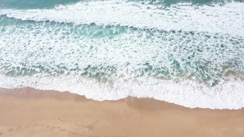 Aerial flight and drone view of El Palmar Mangueta beach surfers Stock Footage 143657178