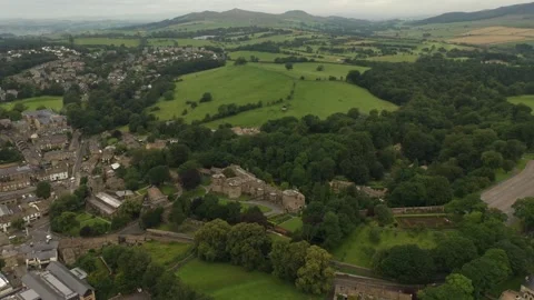 Aerial flight around Skipton Castle and countryside Stock Footage 292126483