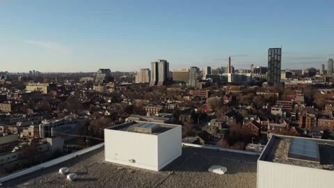 Aerial flight backwards and camera panning down to reveal AGO in Toronto as well Stock Footage 151922326