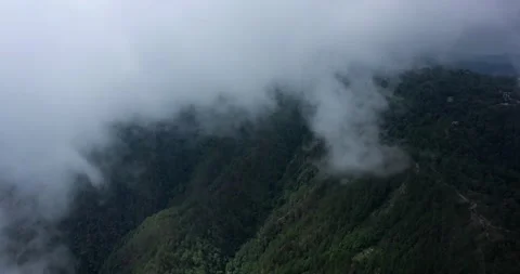 Aerial Flight Between Clouds, Drone Reveal of Village From Morning Mist Stock Footage 152306479