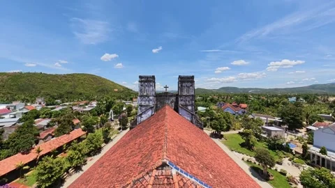 Aerial flight between the twin bell towers of Mang Lang Church Vídeo Stock 341567203