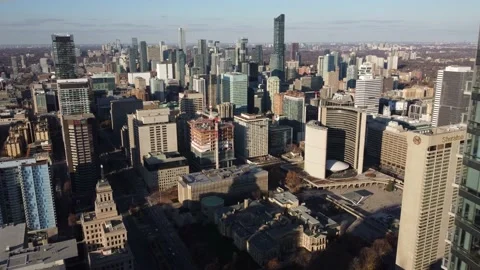 Aerial flight close to skyscraper and looking at the Toronto skyline and city ce Stock Footage 151922042