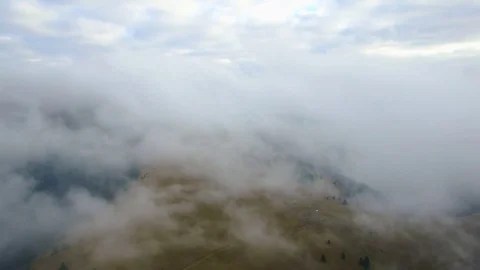 Aerial Flight In Cloud Inversion In Dark Mountains With Drone Video stock 79697302