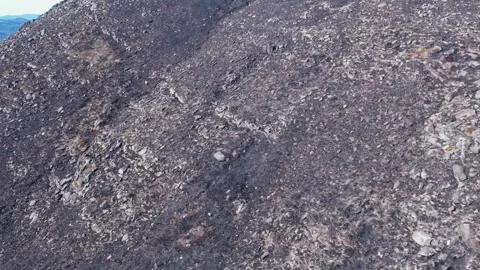 An Aerial Flight Down a Burned Mountain The Concept of a Devastation 스톡 동영상 318443537