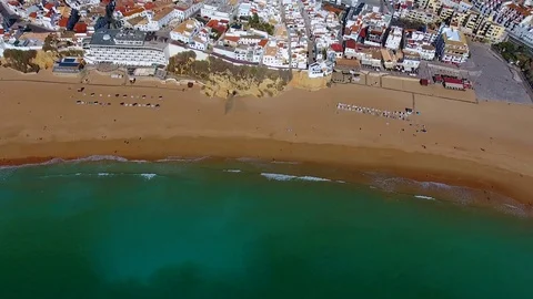 Aerial. Flight of the drone over beach of Albufeira portugal Stock Footage 83127171