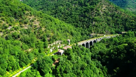 Aerial flight drone view 4k Abandoned rail Station Appenino Tuscany Italy Stock Footage 197562436