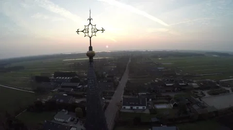 Aerial flight dusk time moving near top of church tower beautfiul sky 4k Stock Footage 61156978