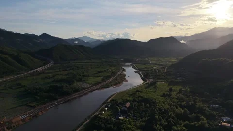 Aerial Flight Following River Through Pueblo Nuevo Valley in Vietnam Stock Footage 337948605