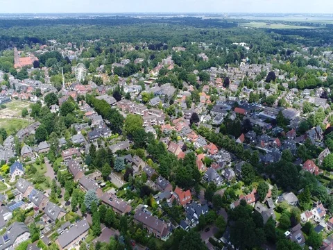 Aerial flight footage of small town in Netherlands Laren 4k Stock Footage 80730652
