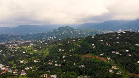 Aerial flight forward to the mountain settlement near Batumi, Georgia Stock Footage 106015848