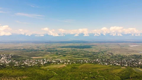 Aerial flight forward to open spaces of Alazani Valley, Georgia. Taken by drone Stock Footage 106462099