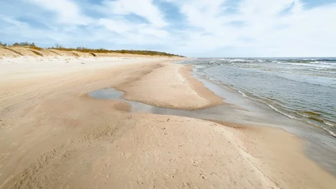 Aerial Flight Forward Through Beach at Seaside Video stock 90049490