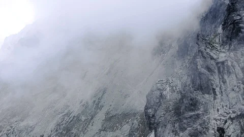 Aerial flight inside the Clouds at peaks in High Tatras Mountains in Slovakia Stock Footage 125996421