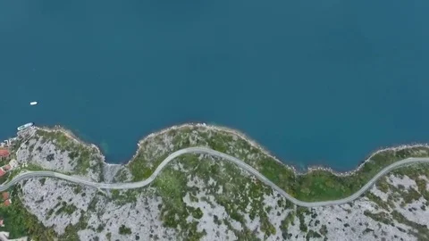 Aerial flight looking down on cliffs and coast line Stock Footage 82808677
