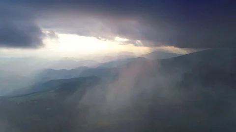 Aerial. Flight in mountains like bird through clouds. Stock Footage 83067834