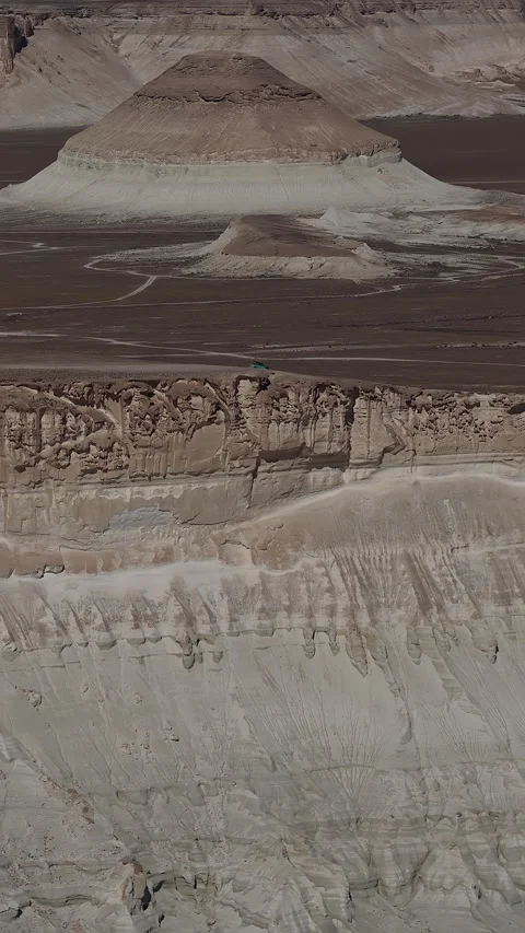 Aerial flight over the alien landscape of bozzhira tract, Mangystau, Kazakhstan Stock Footage 322826749