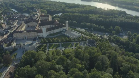 Aerial flight over an Austrian Catholic temple along the Danube River Stock Footage 112328086