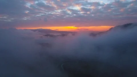 Aerial Flight Over Beautiful Sunset Cloud Inversion In Mountains Stock Footage