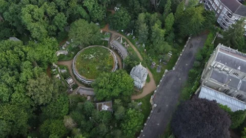 Aerial flight over catacombs of Highgate cemetery Stock Footage 158563447
