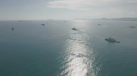 Aerial flight over Chinese coast guard vessels in South China Sea Stock Footage 67527467