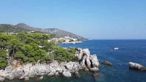 Aerial flight over cliff coastline to new beaches Stock Footage 254633936