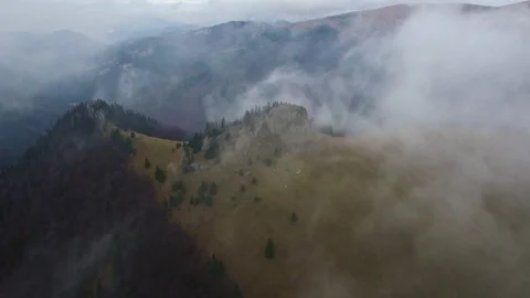 Aerial Flight Over Clouds Inversion In Dark Mountains With Drone Video stock 79697458
