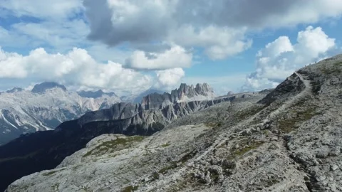 Aerial flight over cloudy Dolomites Stock Footage 169286586