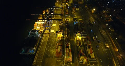 Aerial: flight over the container ship anchored in the port quay - 17 動画素材 98312249