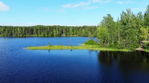 Aerial flight over dark blue lake, North Europe nature Stock Footage 92218084