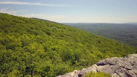 Aerial flight over dense green forest of the Appalachian trail in New Hampshire Stock Footage 111452268