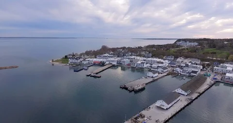 Aerial flight over downtown Mackinac Island Stock Footage 112800103