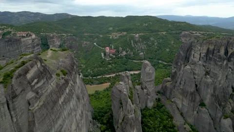 Aerial Flight Over Famous Rocks in Meteora, Greece Drone Towards The Holy M.. Stock Footage 334893807