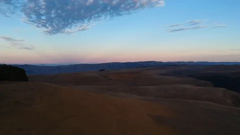 Aerial. flight over a field in the Mountain Ranges Stock-Footage 99044161