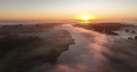 Aerial flight over foggy Oder River at sunrise near Wrocław Stock Footage 346659865
